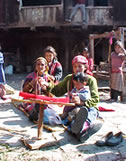 Women spinning the yarn